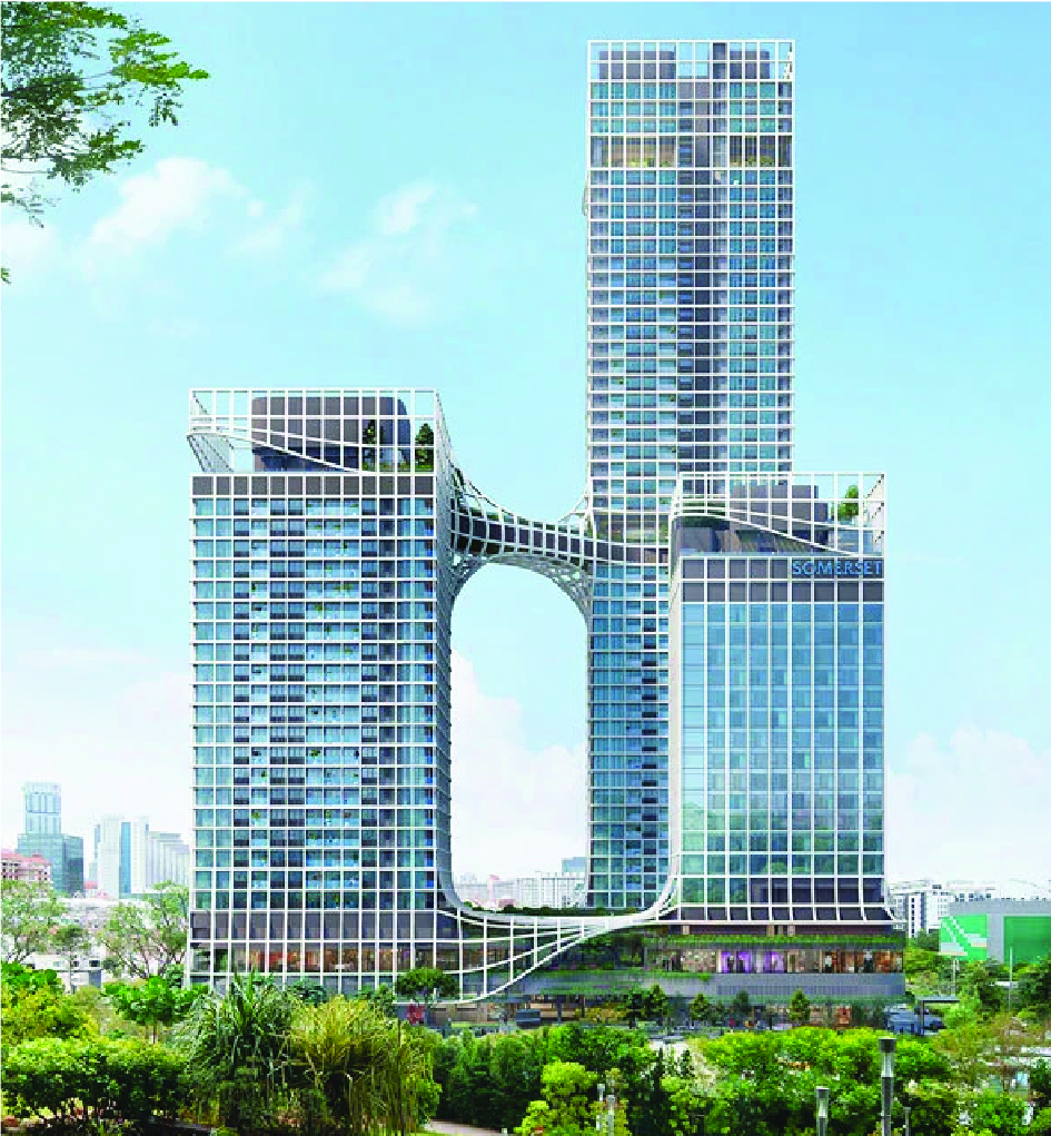 Modern glass skyscrapers connected by a curved bridge forming a U-shaped opening, with a park in the foreground