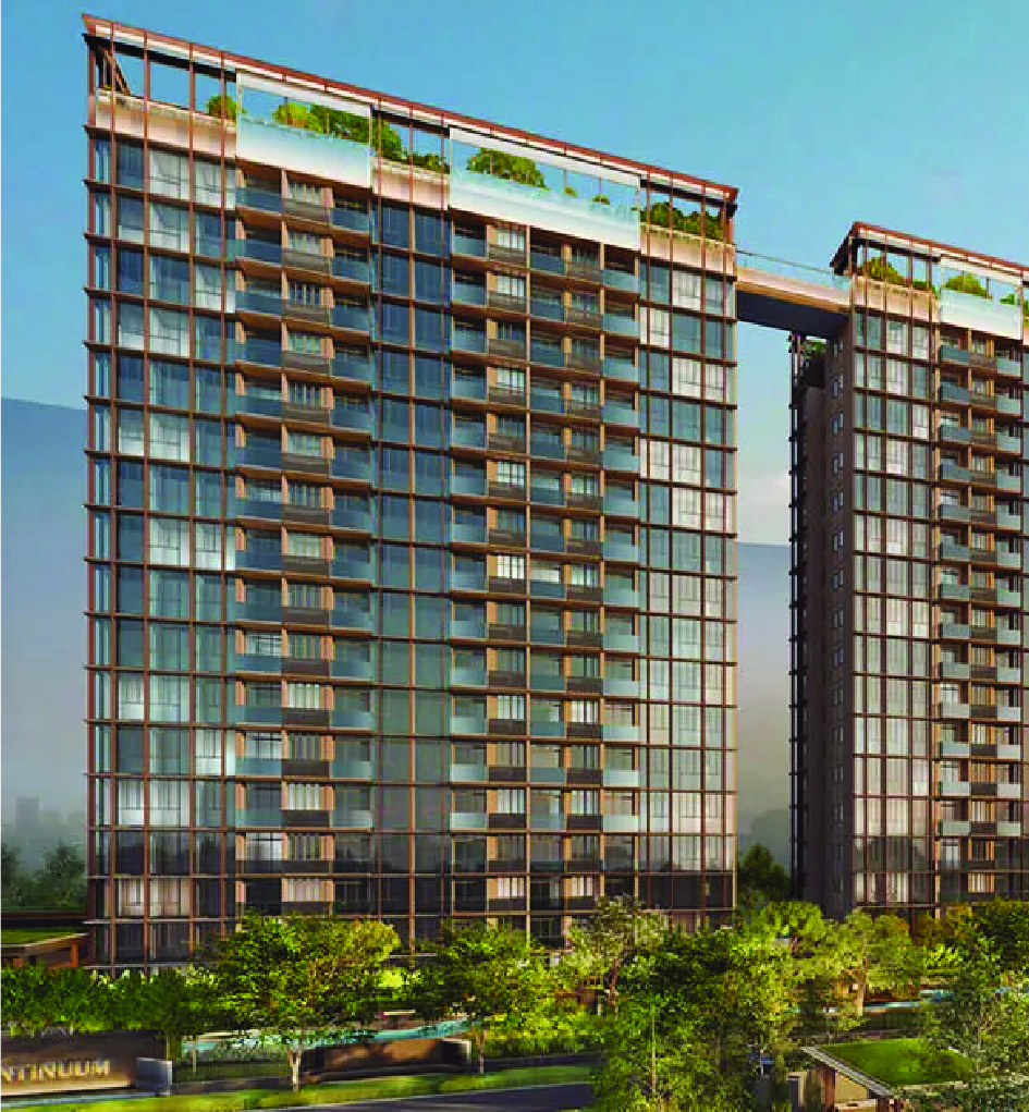 Two glass-fronted modern apartment towers connected by a skybridge, with rooftop greenery and trees in the foreground.