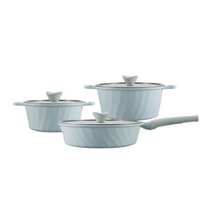 Set of three light-blue nonstick saucepans with glass lids and matching handles, arranged on a white background.